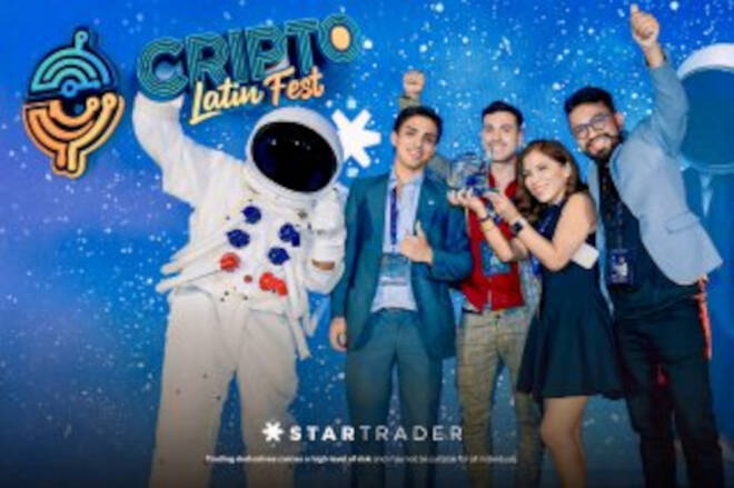 STARTRADER team and astronaut. FX Empire