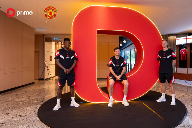 Doo Prime logo and Manchester United football players. FX Empire
