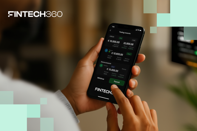 Trader using Fintech 360 app on smartphone. FX Empire