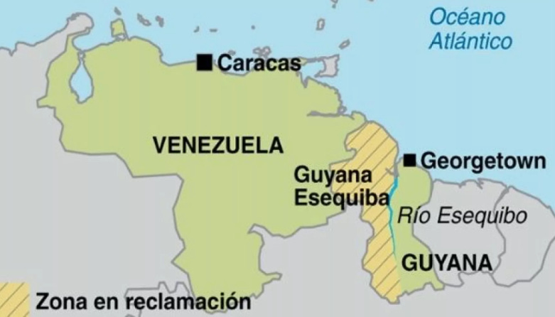 Map showing Venezuela, Guyana, and the disputed Essequibo region, highlighting major cities Caracas and Georgetown, as well as the claimed territory along the Essequibo River