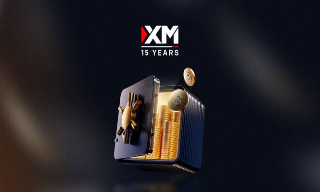 Vault with US Dollars, XM Logo and their 15 year anniversary.
