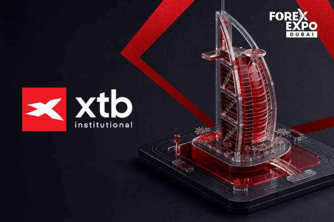 XTB Institutional promotional image for Forex Expo Dubai featuring a 3D model of the Burj Al Arab.