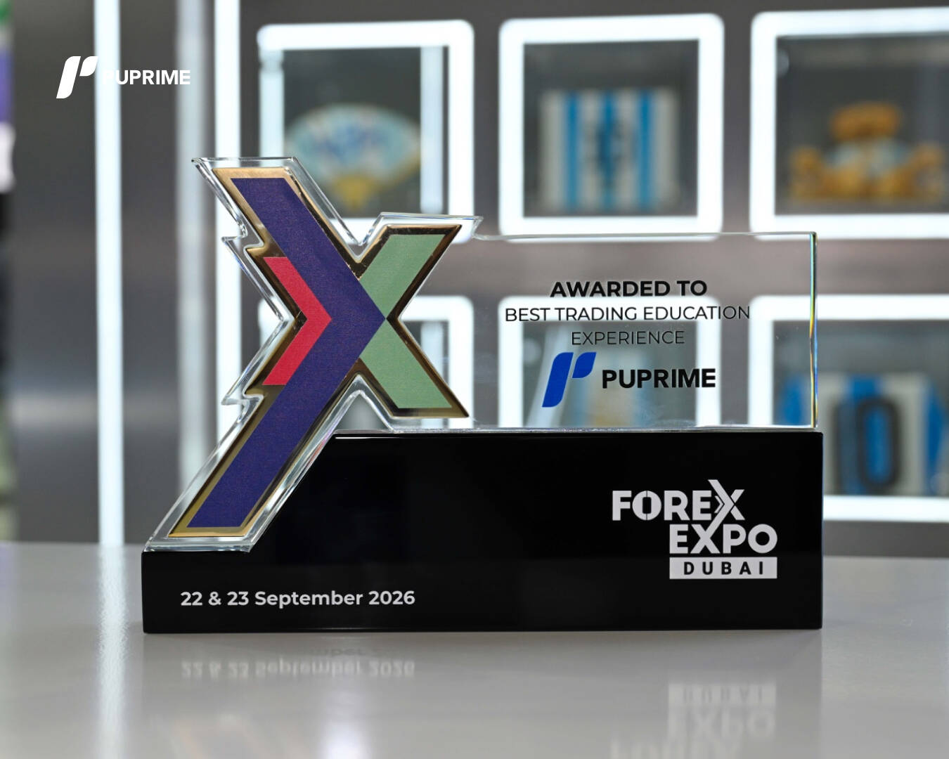 Forex Expo Dubai 2026 crystal award trophy presented to PU Prime for 