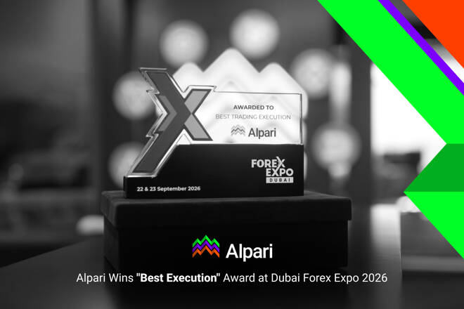 Alpari Best Trading Execution Award trophy at Dubai Forex Expo 2026, featuring Alpari branding and colorful geometric graphics against a black-and-white background.