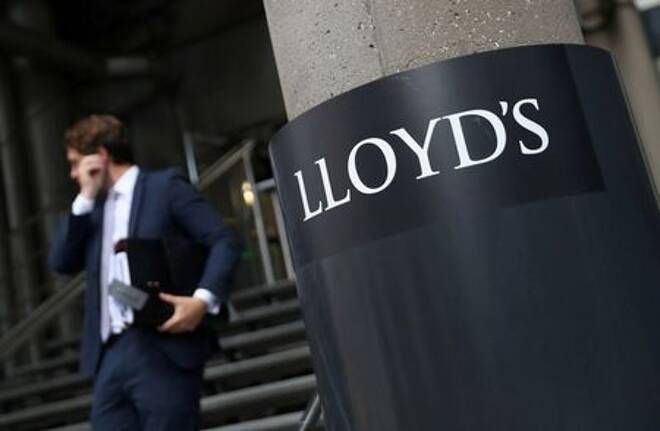 A man walks out of Lloyd's of London's