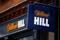 Signs are seen outside a branch of bookmaker William Hill