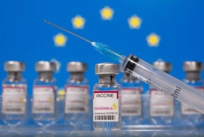 Vials labelled "Astra Zeneca COVID-19 Coronavirus Vaccine" and a syringe