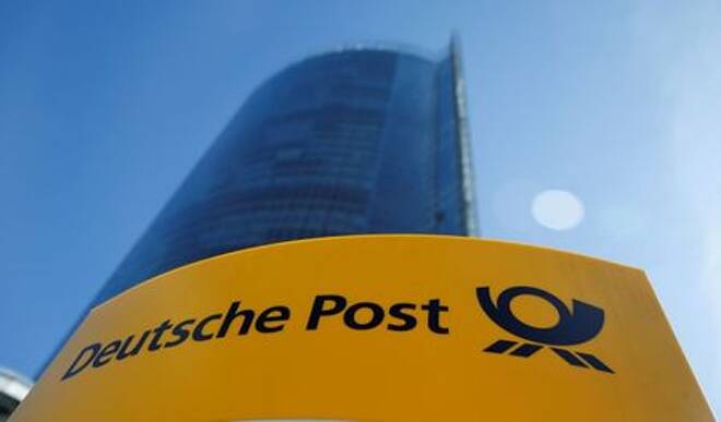 A Deutche Post sign stands in front of