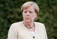 German Chancellor Angela Merkel takes part in a wreath-laying ceremony in Kyiv