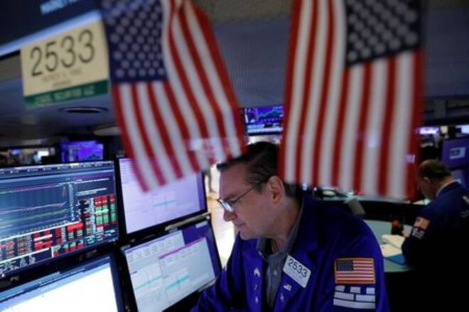 Traders works at the New York Stock Exchange (NYSE) in Manhattan, New York City