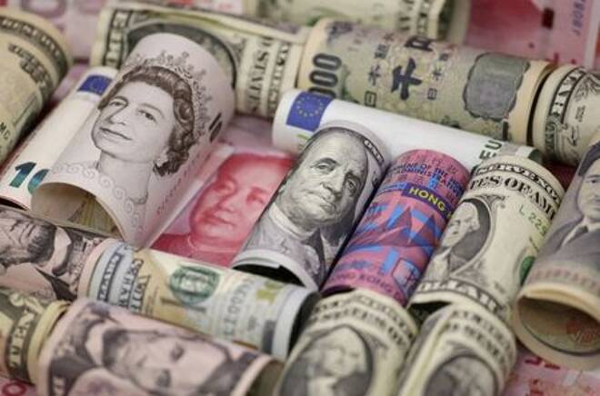 Euro, Hong Kong dollar, U.S. dollar, Japanese yen, British pound and Chinese 100-yuan banknotes are seen in a picture illustration