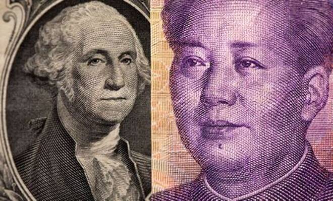 U.S. one dollar and Chinese Yuan are seen in this illustration
