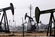 FILE PHOTO: Oil drills are pictured in the Kern River oil field in Bakersfield