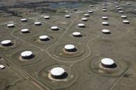 FILE PHOTO: Crude oil storage tanks are seen from above at the Cushing oil hub in Cushing, Oklahoma, U.S.