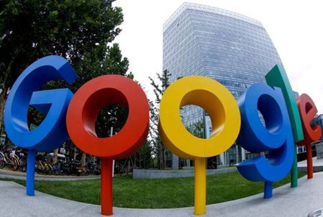 FILE PHOTO: The brand logo of Alphabet Inc's Google is seen outside its office in Beijing
