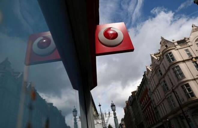 A branded sign is displayed on a Vodafone