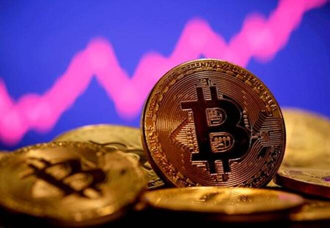 FILE PHOTO: A representation of virtual currency Bitcoin is seen in front of a stock graph in tFILE PHOTO: A representation of virtual currency Bitcoin is seen in front of a stock graph in this illustration takenFILE PHOTO: A representation of virtual currency Bitcoin is seen in front of a stock graph in this illustration takenhis illustration taken