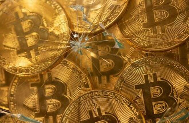 Representations of virtual currency bitcoin are seen through