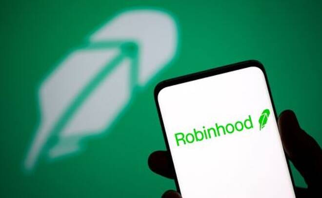 Robinhood logo is seen on a smartphone in front of