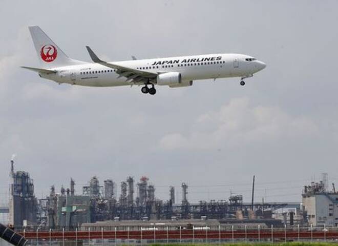 JAL's airplane flies nearby Haneda Airport in Tokyo