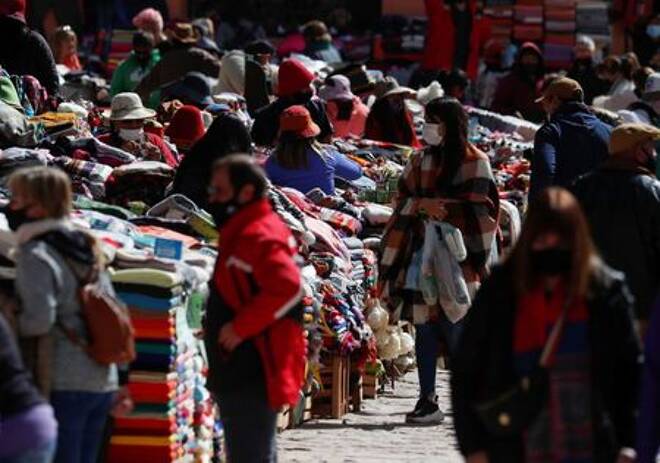 Costumers shop at a street market, in Purmamarca, Jujuy