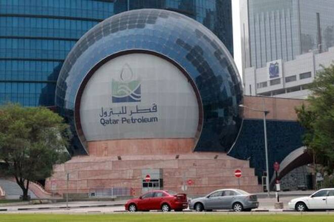 Cars are parked outside the headquartes of Qatar Petroleum in