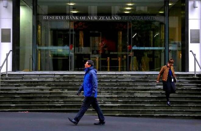 FILE PHOTO: FILE PHOTO: Pedestrians walk near the main entrance to the Reserve Bank of New Zealand located in central Wellington, New Zealand