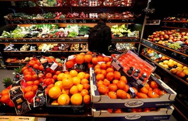 Full shelves with fruits are pictured in a