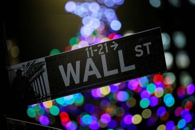 The Wall St. sign is seen outside the NYSE in New York