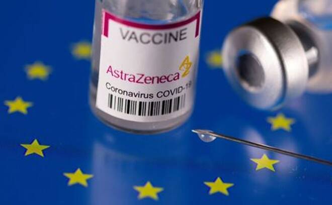 Vials labelled "AstraZeneca coronavirus disease (COVID-19) vaccine" placed