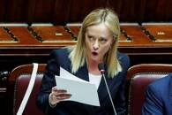 La presidente del Consiglio Giorgia Meloni assiste alla seduta della Camera del Parlamento in vista del voto di fiducia per il nuovo governo, a Roma
