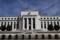 البنك المركزي الأمريكي يشير إلى أنه سيرفع أسعار الفائدة في مارس