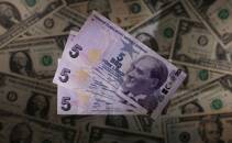 ARCHIV: Türkische Lira-Banknoten auf US-Dollar-Banknoten, 28. November 2021. REUTERS/Dado Ruvic/Illustration