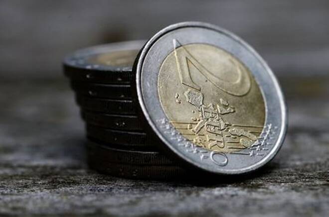 A pile of two Euro coins is pictured in an