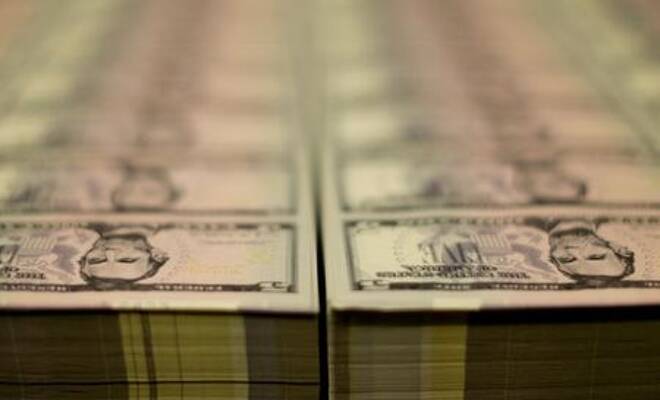 Stacks of Lincoln five dollar bill are seen at
