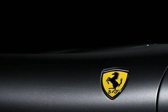 The Ferrari logo is pictured as Ferrari Roma