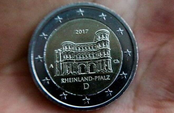 A newly designed 2-Euro coin is pictured during