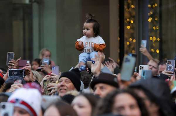 Americans celebrate Thanksgiving with parades, feasts and football thumbnail