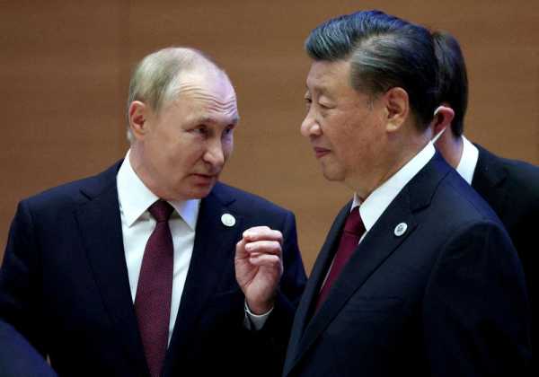 On eve of Xi visit, Putin welcomes Chinese role in Ukraine crisis